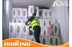12 Containers of rock wool loading at night for helping catch the shipping
